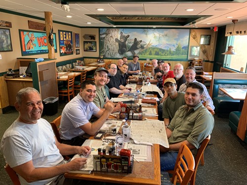 Men having breakfast together